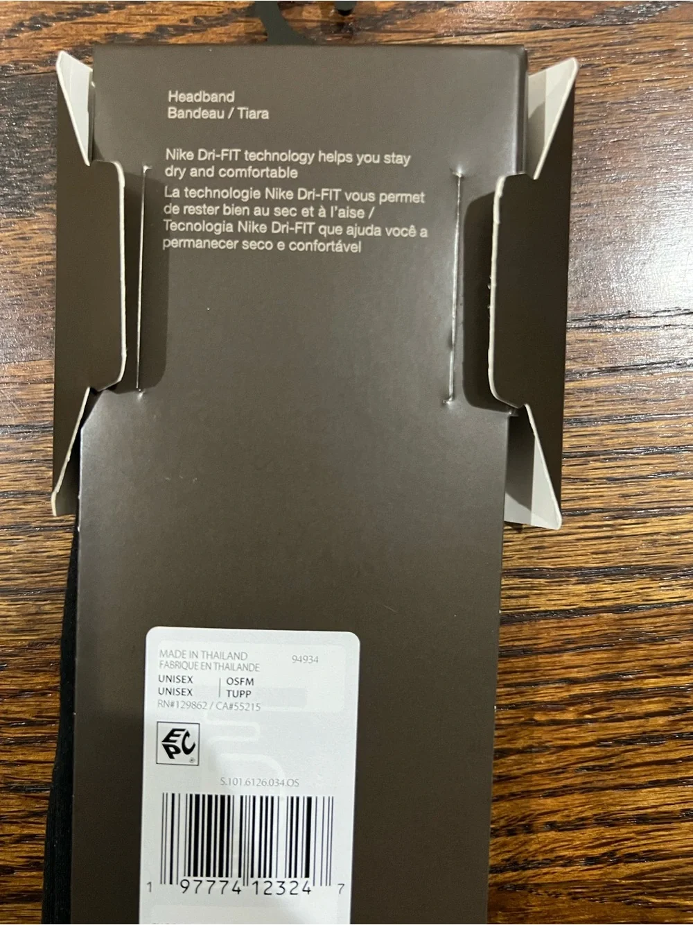 Nike x SKIMS elastic headband featuring a debossed dual-brand logo
